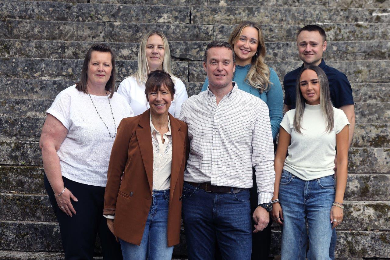 Andrew and Louisa Godfrey (front) with other members of the management team.