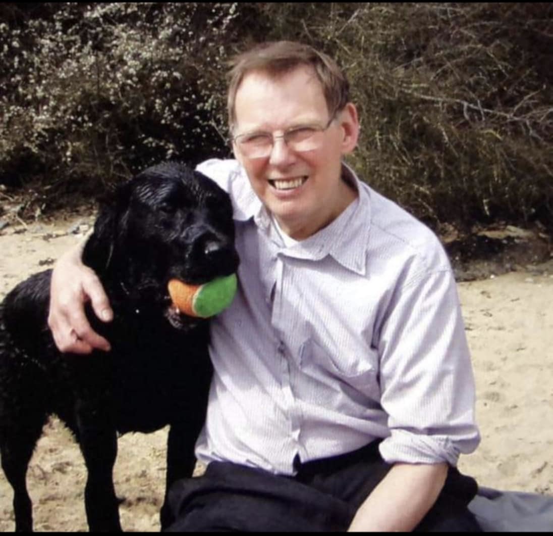 David Birch with his dog Rossi.